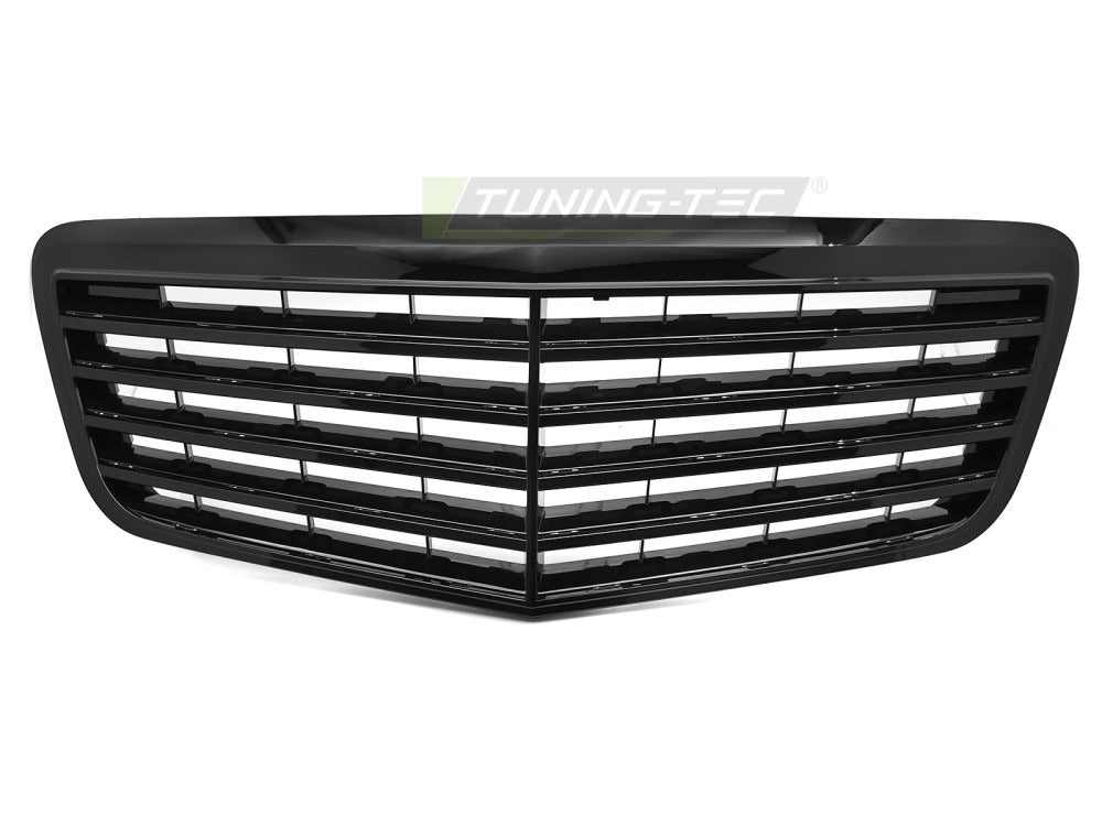 Detaljbilde av Grill Mercedes E-Klasse W211/S211 06-09 sort med lamellstruktur og emblemfeste.
