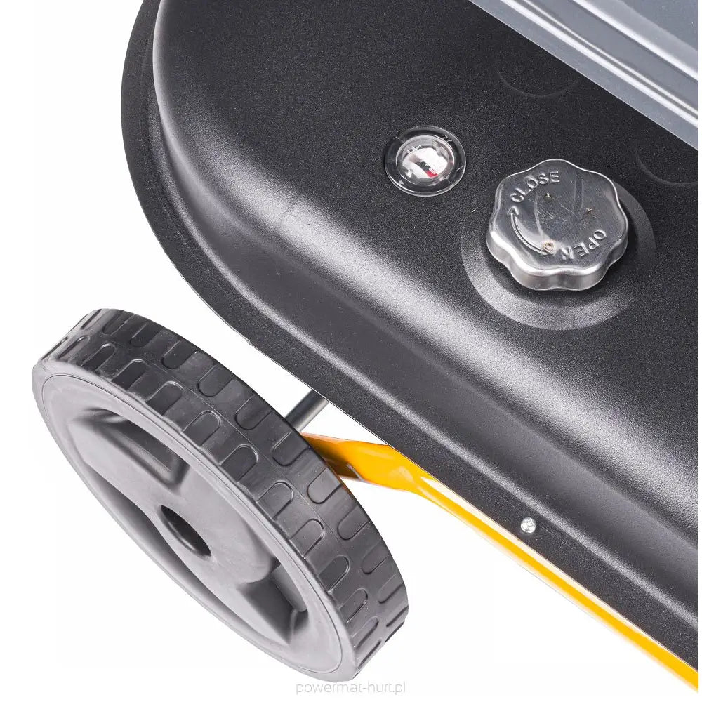 Dieselvarmer med svart metallchassis, plasthjul, måleglass og sølvfarget skruknapp merket open/close.