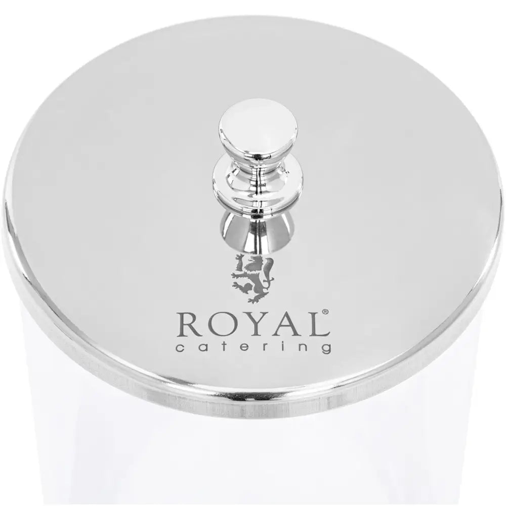 Dispenser for nøtte- og søtsakskanone, detalj av sølvfarget metallokk med "ROYAL catering" og løve-logo.