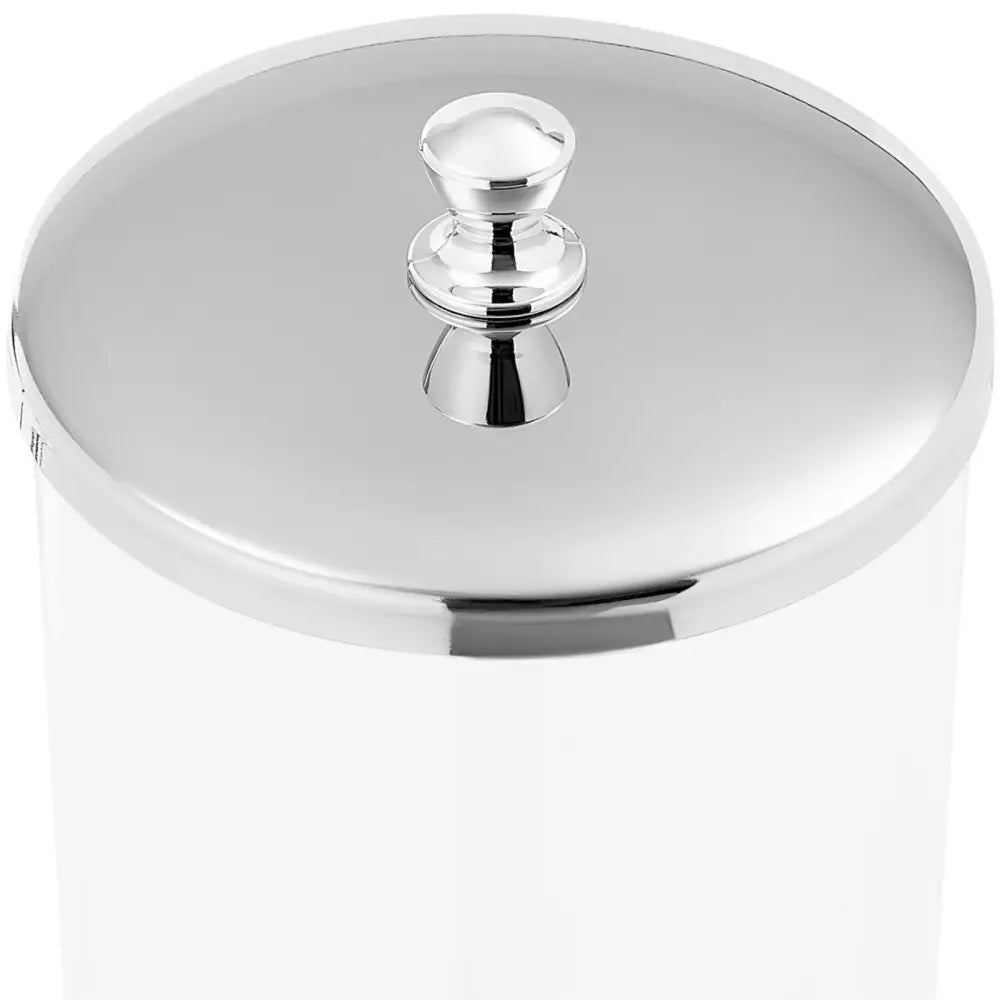 Dispenser for ris og godteri, nærbilde av sølvfarget lokk med speilblank finish og avrundet håndtak.
