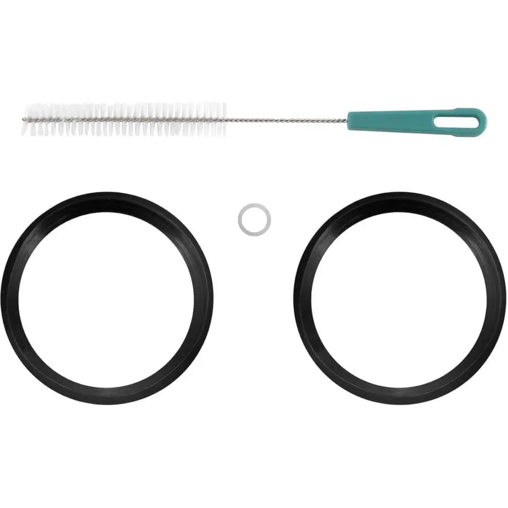 To rengjøringsbørster med grønt håndtak, svarte gummiringer og grå pakning for dispenser kjøler, sett ovenfra.