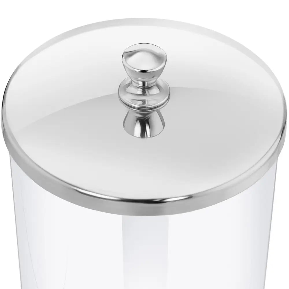 Dobbel dispenser med rustfritt stållokk og rund knott, sett ovenfra på sylinderformet transparent beholder.