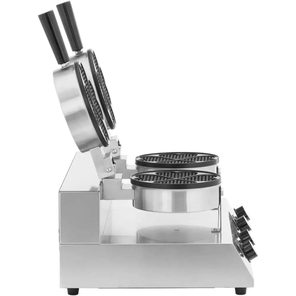 Dobbelt hjerteformet vaffeljern i rustfritt stål, sett fra siden med åpne lokk og synlige kontrollknapper.