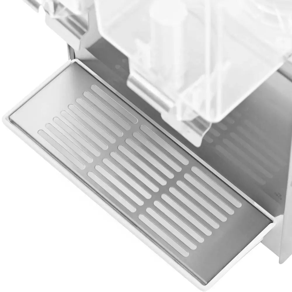 Dryppbrett i børstet stål med rektangulære avrenningshull, sett ovenfra på Dozit drikkevaredispenser.