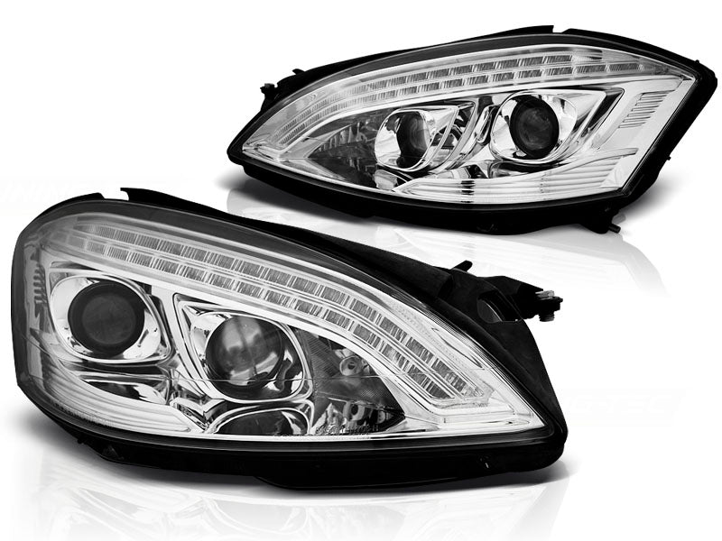 Frontlykter Xenon Daylight Chrome til Mercedes W221 05-09 sett rett forfra på hvit bakgrunn.