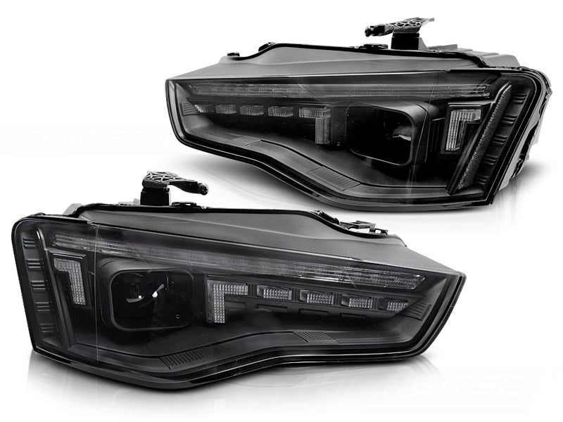 Frontlykter Halogen LED Black Sequential til Audi A5 11-16 Halogen sett rett bakfra på hvit bakgrunn.