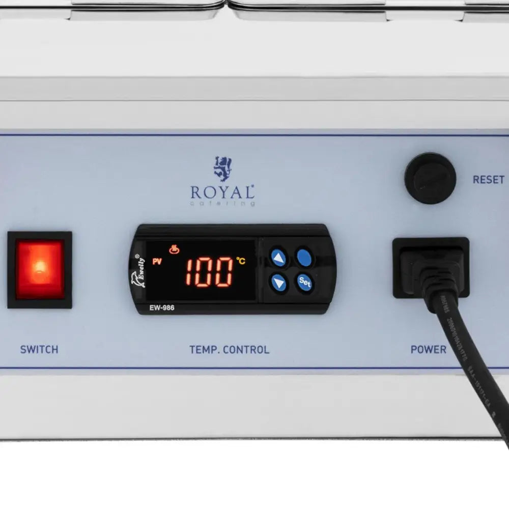 Digitalt kontrollpanel for sjokolade- og sausoppvarmer, viser 100°C, rødt lys i bryteren og tydelige knapper.