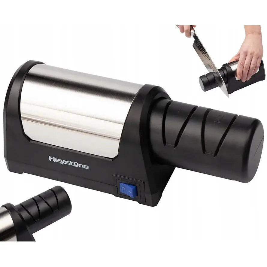 Elektrisk Diamant Universalknivsliper, skråvisning med synlige slipespor, blå bryter og kniv i bruk.