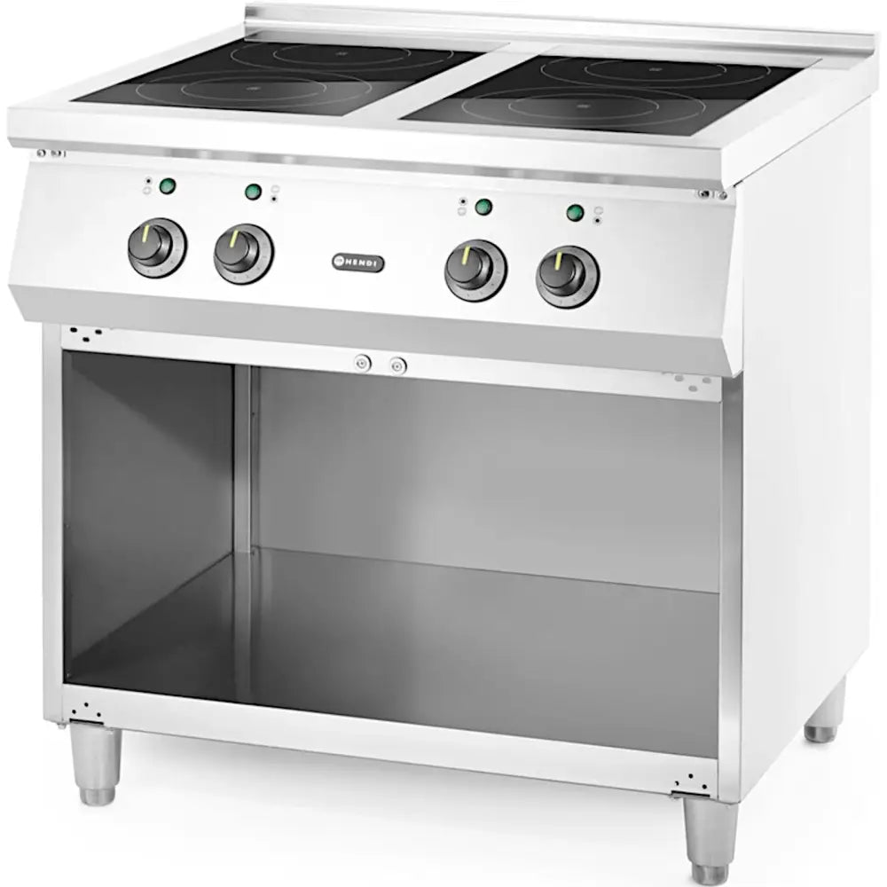 Elektrisk induksjonstopp med fire brennere, rustfritt stål, skrå front, synlige dreieknapper og åpen hylle.