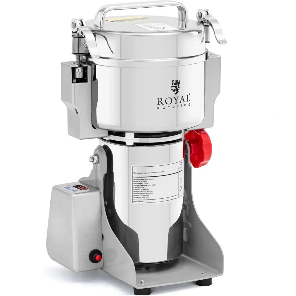 Elektrisk krydder- og nøttekvern i rustfritt stål, skrå forside med rød dreieknapp og Royal Catering-logo.