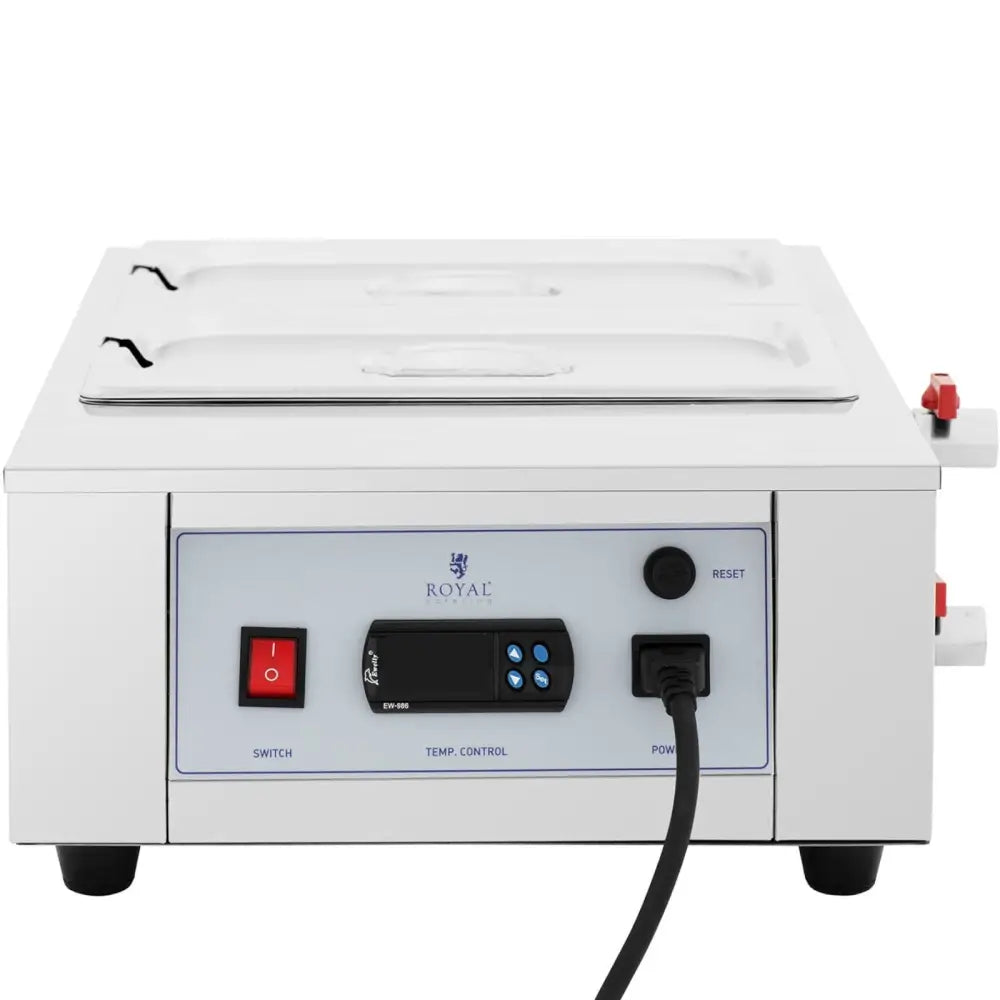 Elektrisk sjokoladesaus varmere med to beholdere, digitale kontroller og røde ventiler synlig på høyre side.