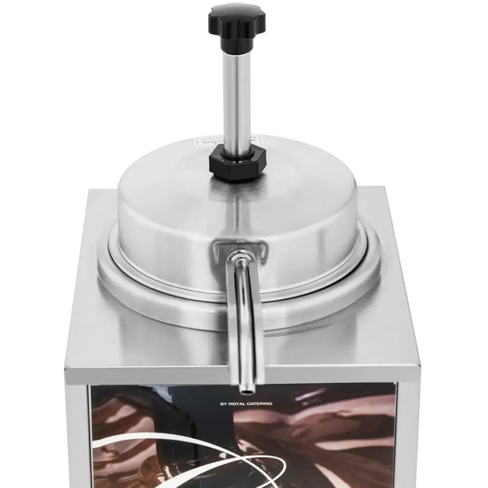 Elektrisk sjokoladesausoppvarmer, skrå forfra med svart pumpe og synlig etikett nederst.