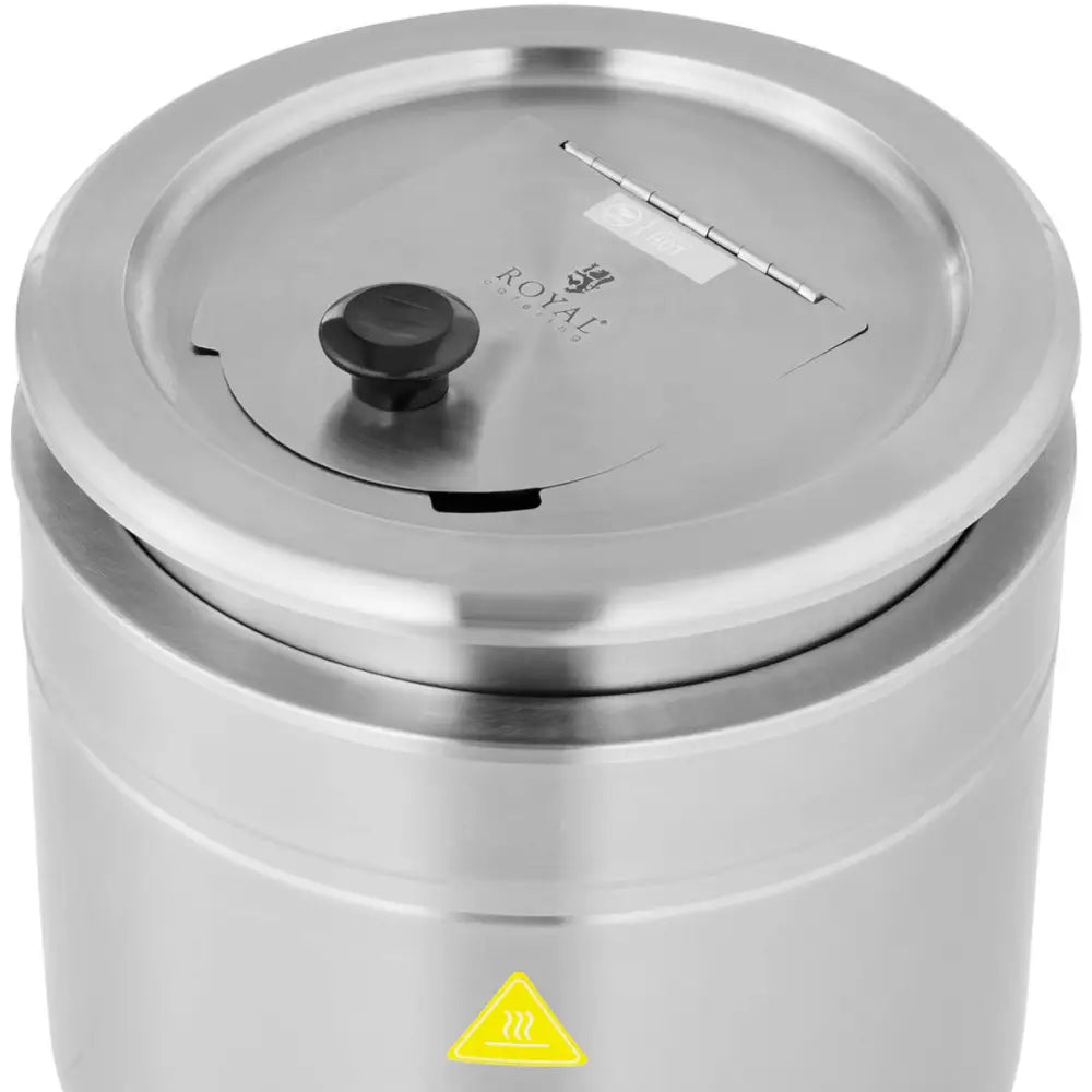 Elektrisk termos gryte i rustfritt stål, skrå overblikk med sort lokkhåndtak og synlig gul advarselsmerking.