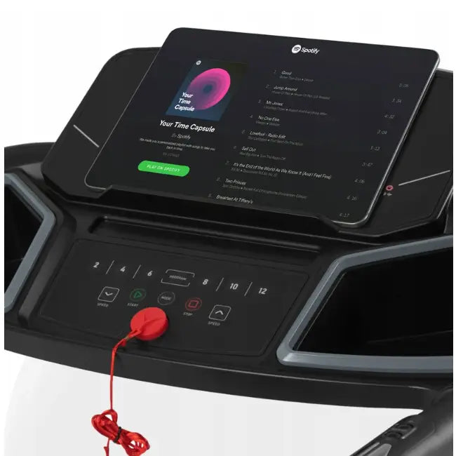 Tredemølle Zipro Colt, nærbilde av kontrollpanel med store knapper, rød sikkerhetsnøkkel og nettbrett med Spotify.