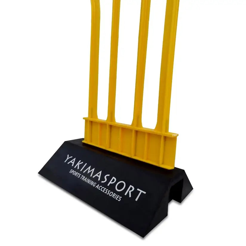 ELITE veggmontert stativ med gult plastgitter og svart sokkel, logo synlig fra skrå frontvinkel.