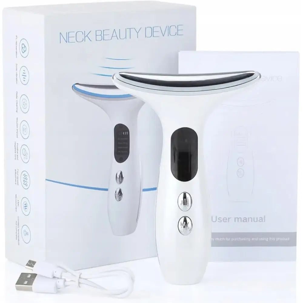 Massasjeapparat V20, frontvisning med sølv- og svarte detaljer, eske, bruksanvisning og to USB-ladekabler bak.