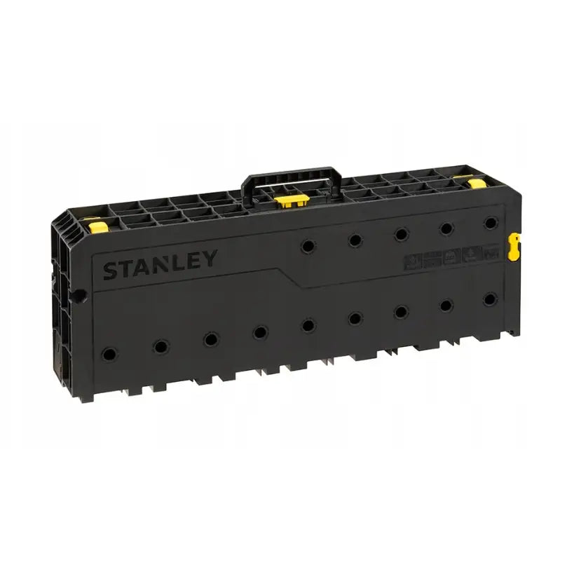 Essential arbeidsbord fra Stanley, sammenleggbart design med sort plastkasse, gule låser og bærehåndtak.