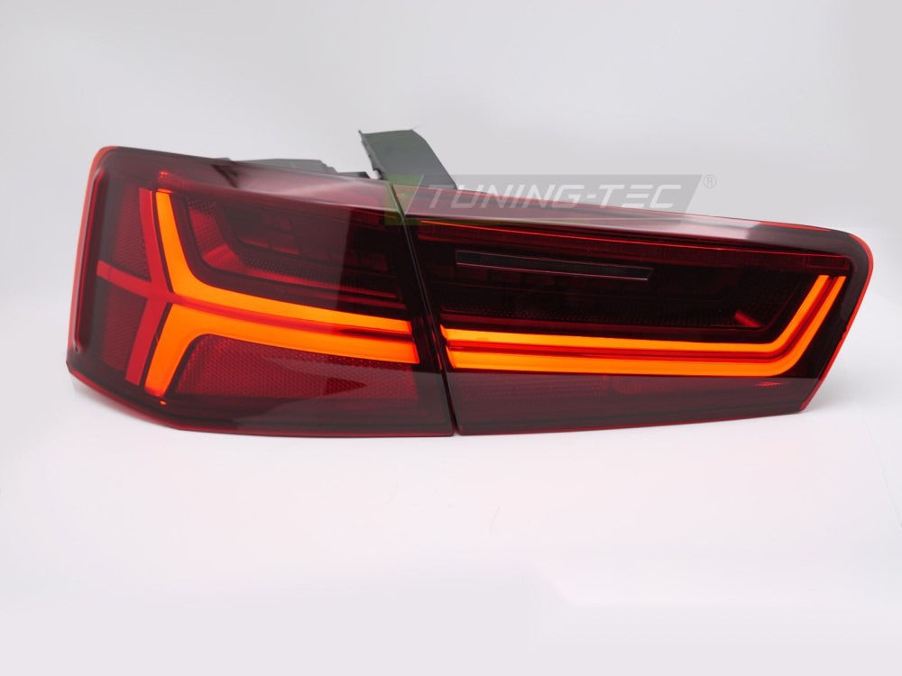 Nærbilde av LED-stripe og lampeglass på baklykt til Audi A6 C7 Sedan 11-14