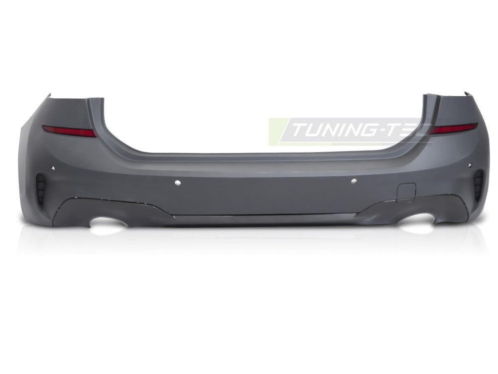 Detaljbilde av støtfanger bak til Bmw G21 Touring 19-22 med sport linjer og diffusor-detaljer.