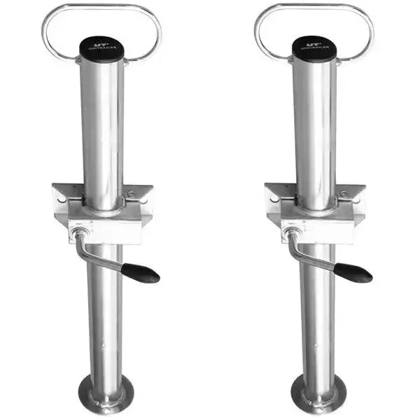 Faste støtter for tilhenger, to sølvfargede sylindere med topphåndtak og sideveis sveiv med sort grep.