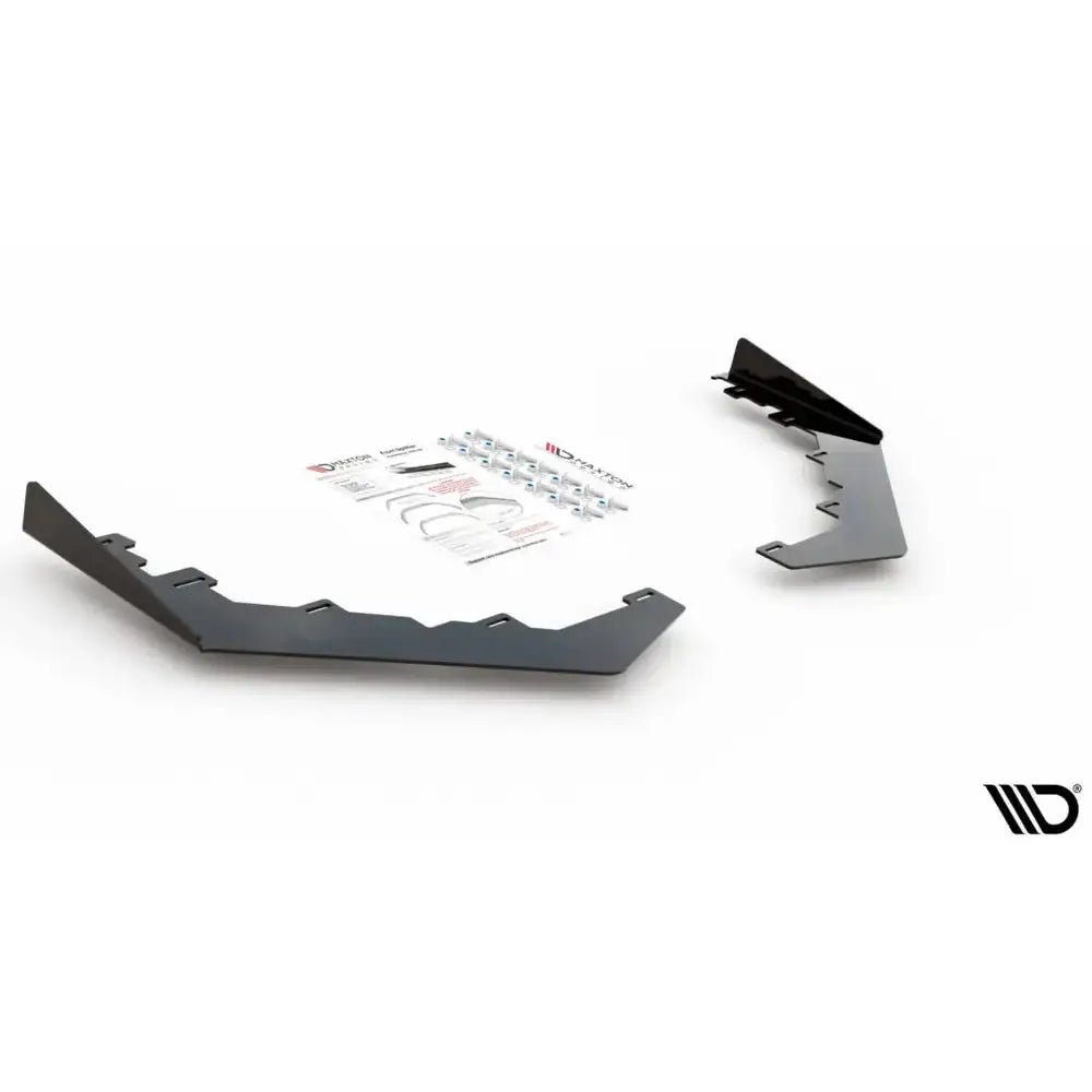 Frontspoiler flaps til Toyota GR Yaris Mk4, svarte metallplater med beslag og instruksjoner i bakgrunnen.