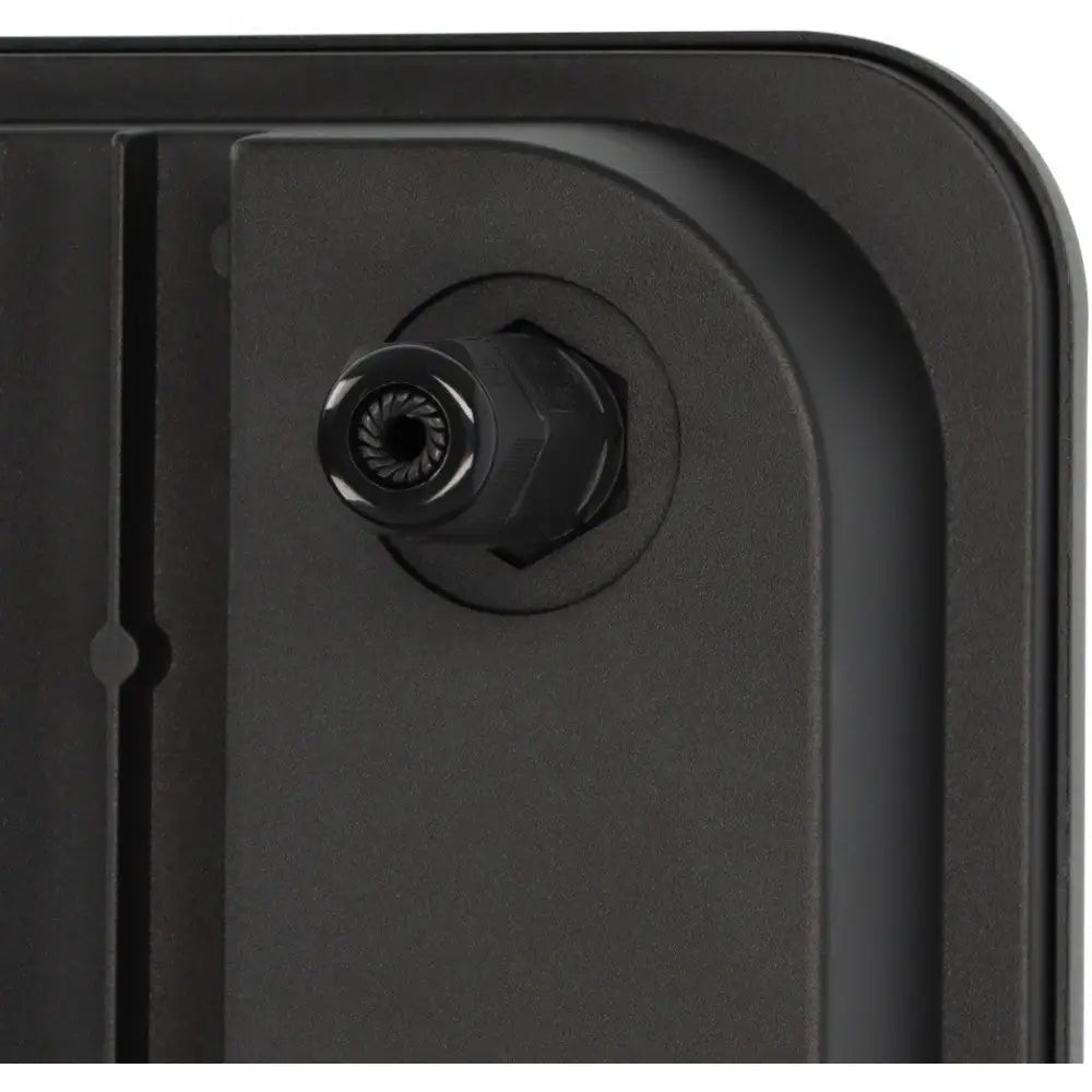 Flomlys LED JARO, nærbilde av svart plastpanel med kabelgjennomføring og detaljer på feste.