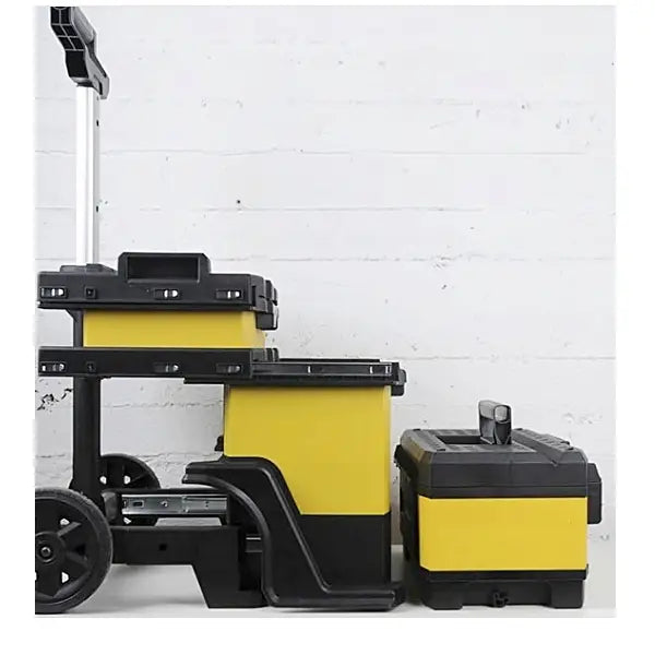 Flyttbar verkstedsvogn fra Stanley, sidevisning med hjul, teleskophåndtak og ekstra verktøykasse.