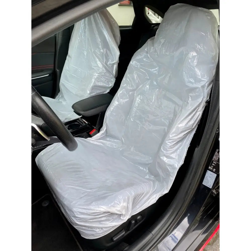 Folietrekk for seter, gjennomsiktig plast som dekker og beskytter bilens forseter sett fra siden.