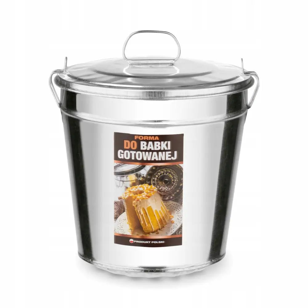 Form for kokt kake i sølvfarget metall, bøtteform med lokk, bærehåndtak og dekorativ etikett.