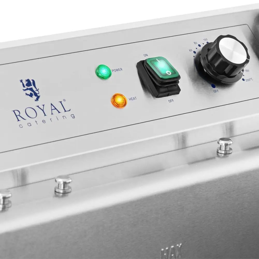 Fritertank kontrollpanel med to indikatorlys, sort av/på-bryter og stor temperaturknapp i børstet stål.