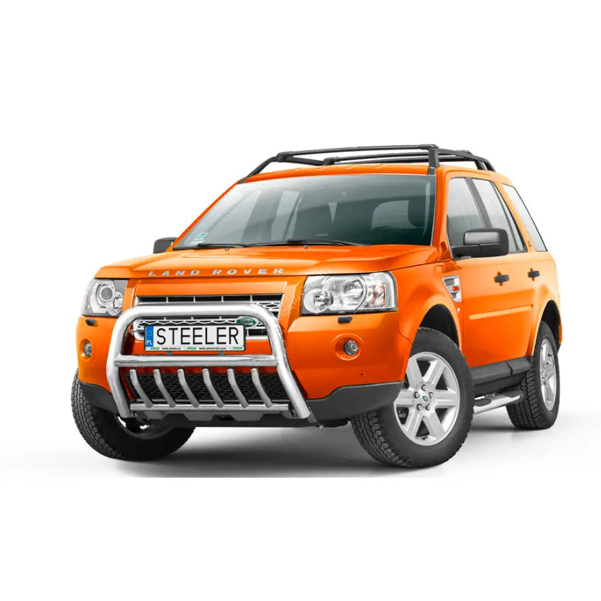 Frontbøyle Land Rover Freelander 07-14 montert foran grill på oransje SUV med sorte detaljer.