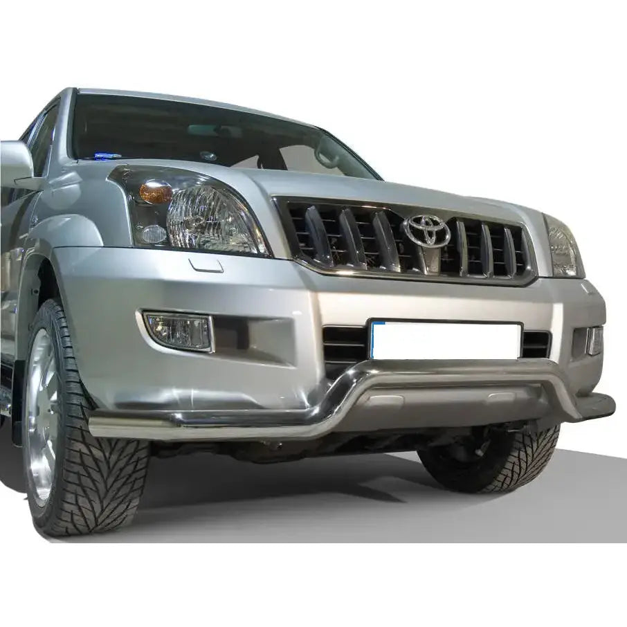 Frontbøyle Toyota Land Cruiser J120 sett forfra med blankt metall og markerte frontlys på asfalt.
