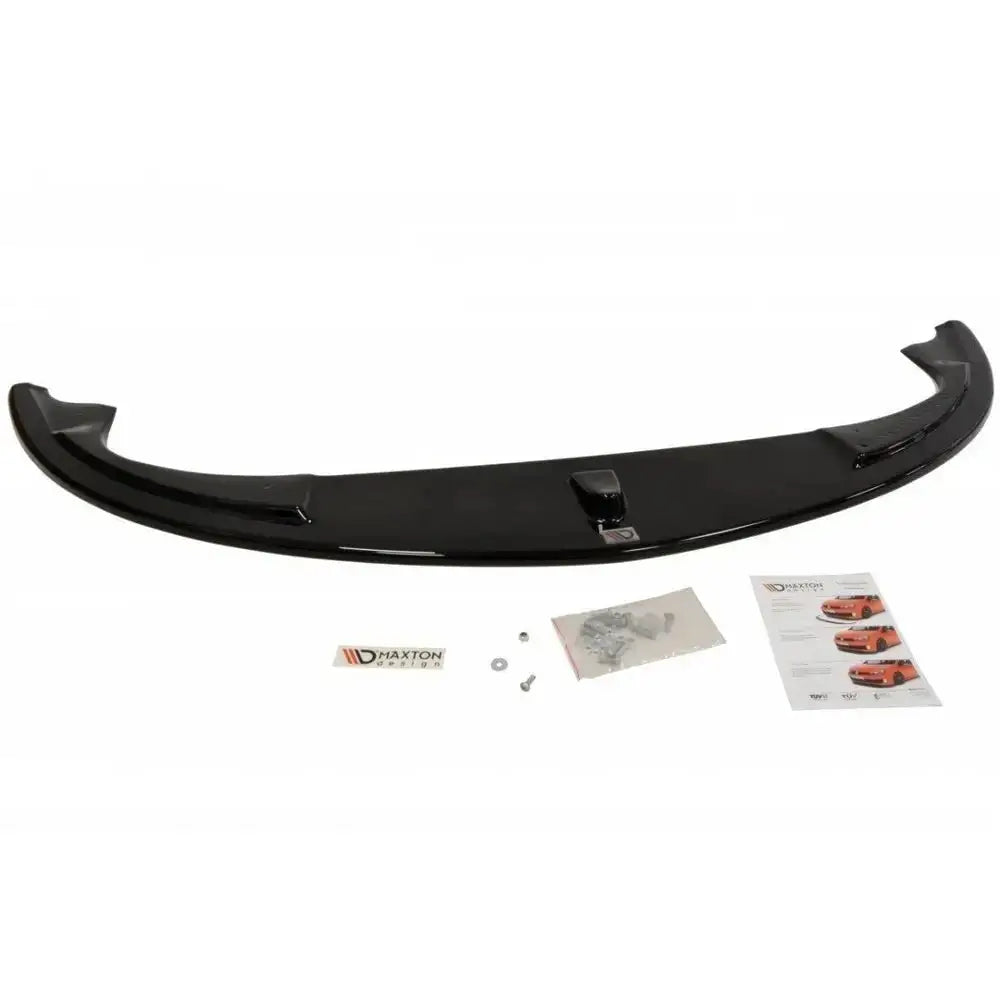 Front lip til Alfa Romeo 147 Gta, sort glanset plastdel med monteringsutstyr og instruksjonsbrosjyre.