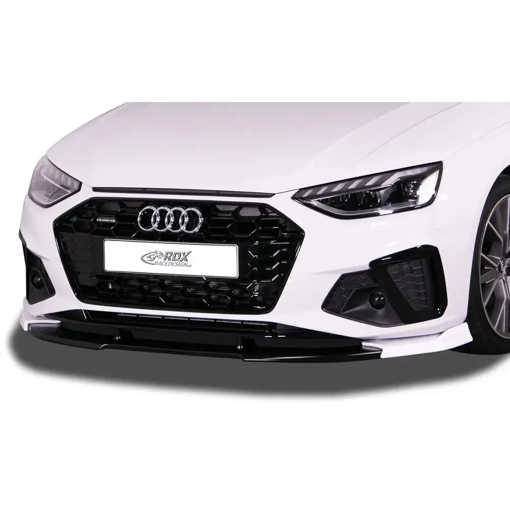 Frontspoiler Audi A4 8W B9 Facelift med sort grill og spoilerlist under støtfanger, sett rett forfra.