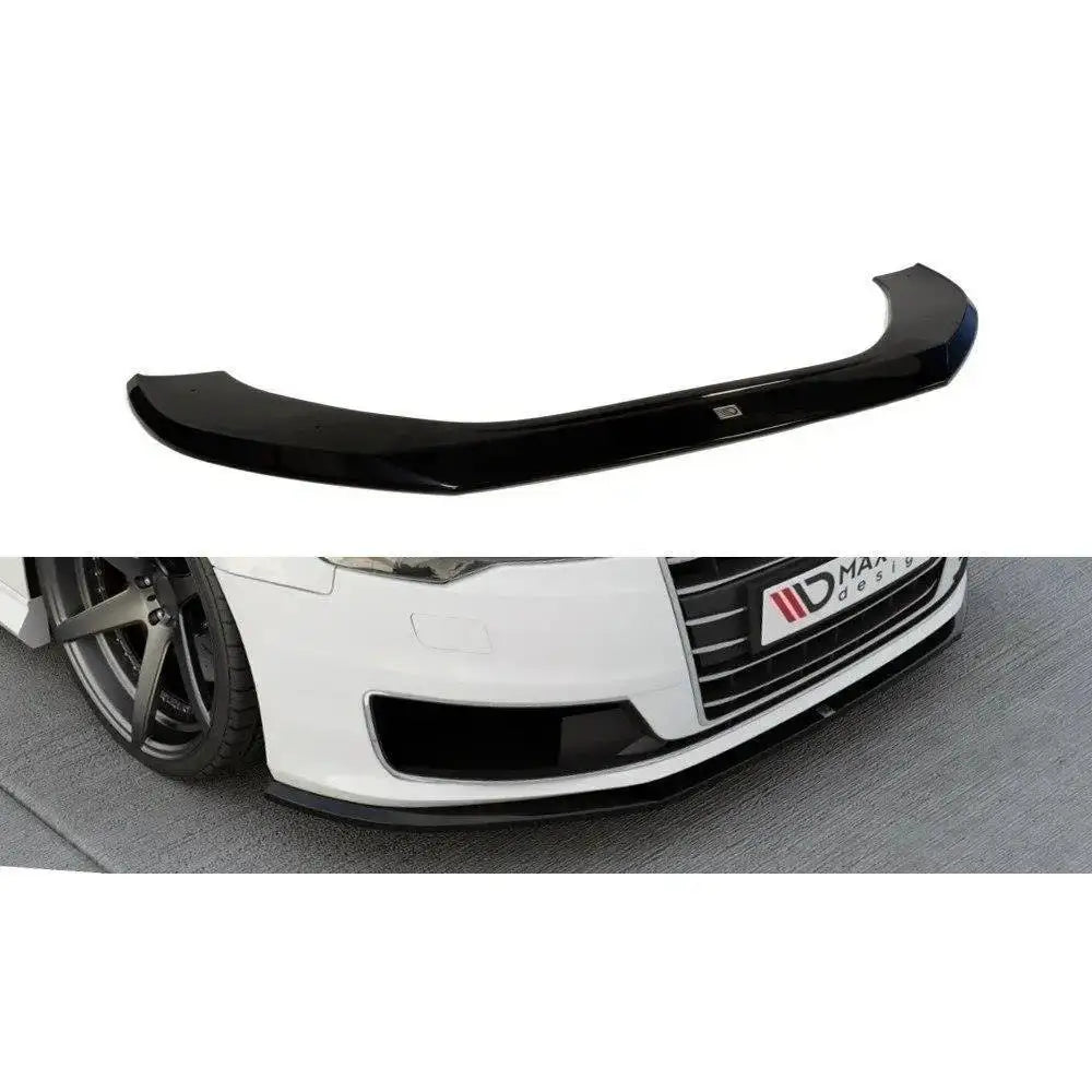 Frontspoiler Audi A6 C7 Ultra i sort blank plast, montert på hvit bil, vist forfra med senket front.