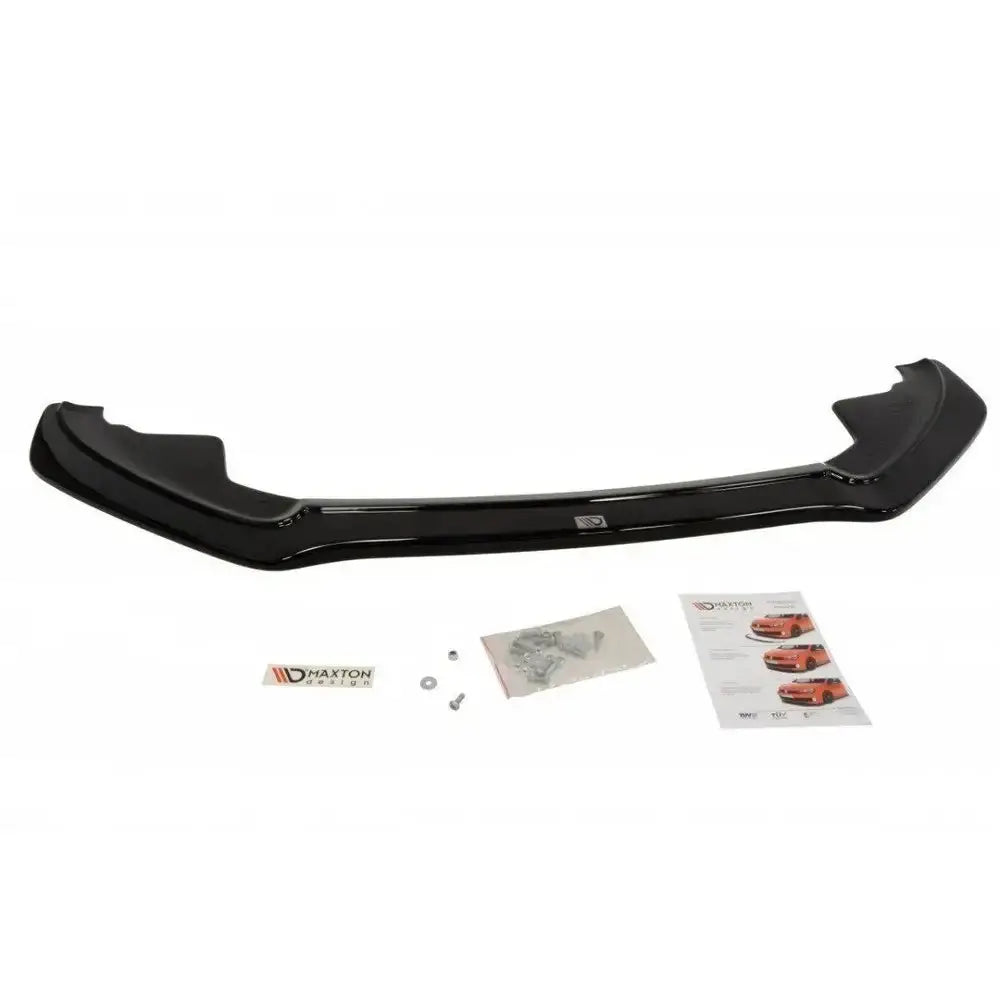Frontspoiler Audi S5 / A5 S-Line 8T i sort glanset plast med utstyr, logo og instruksjoner foran.