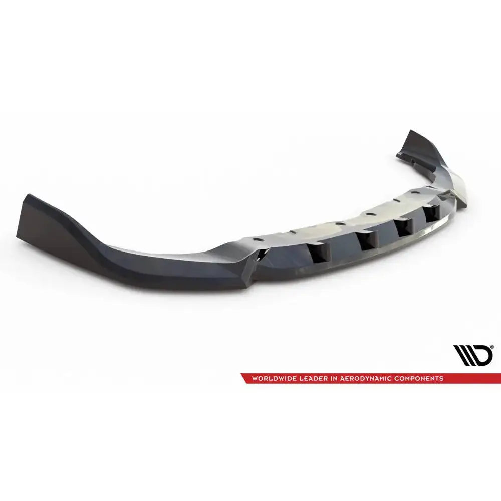 Front lip til BMW 1 Serie F40 M-Pack, sort plast med markerte kanter og åpninger, skrå vinkel.