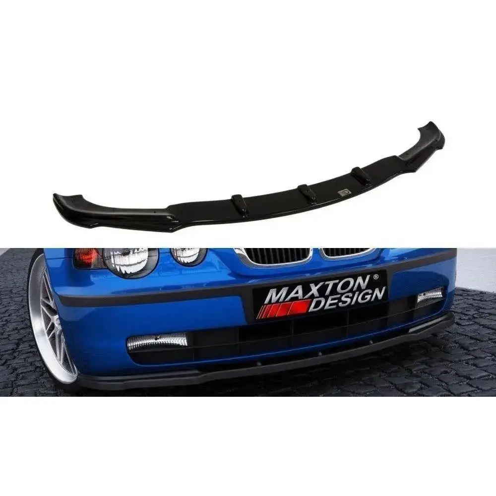 Frontspoiler til BMW 3 E46 Compact i sort plast fra skrå vinkel, montert på blå bil med Maxton Design-logo.