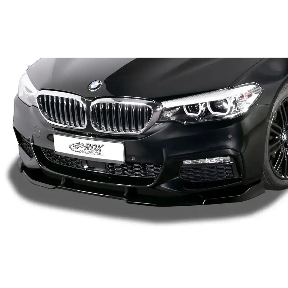Frontspoiler til BMW 5 G30/G31/G38 M-Sport, sort bil forfra med blank grill og markante frontlykter.