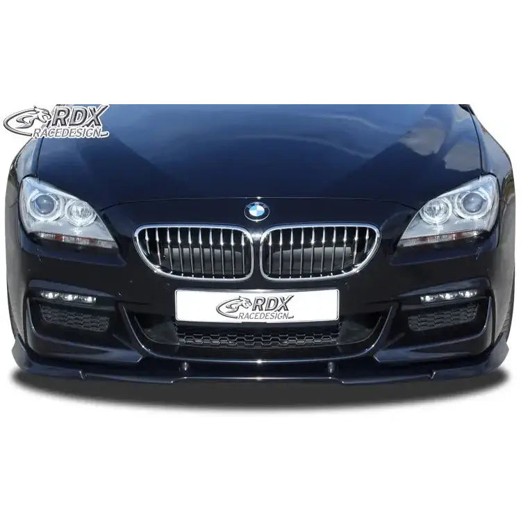Frontleppe BMW 6er F06 Gran Coupe M-Technic i sort plast, sett forfra med krom grill og RDX-logo.