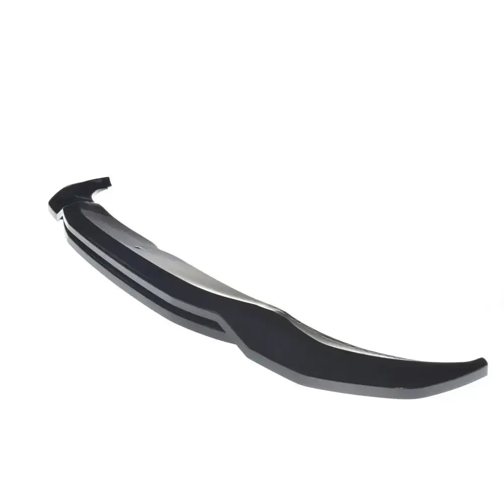 Frontspoiler BMW X4 M-Pack G02 i sort, glanset plast, vist fra siden med markerte, aerodynamiske kanter.