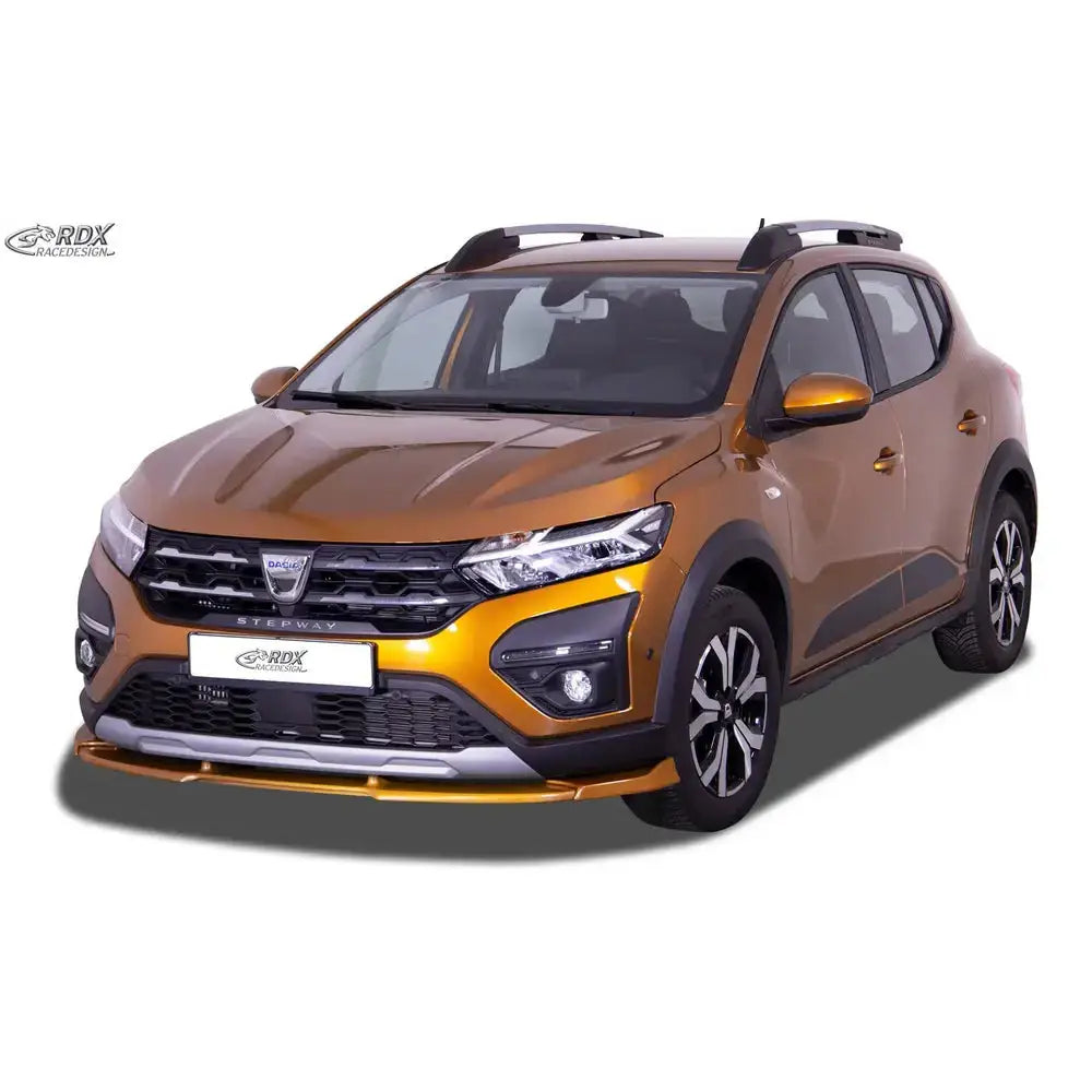 Frontleppe på Dacia Sandero 3 Stepway 21- Vario X, oransje SUV med svarte detaljer og tofargede felger.