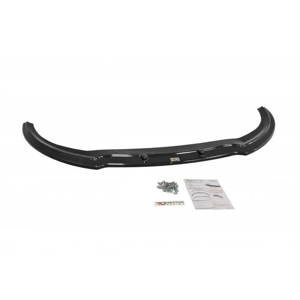 Frontspoiler til Fiat Bravo Mk 2 Sport i svart blank plast med monteringsskruer og anvisning.