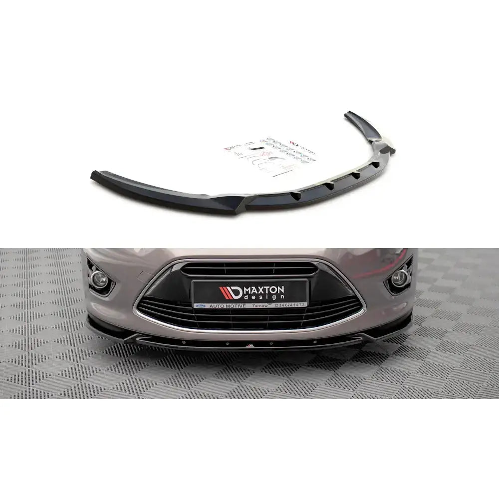 Frontspoiler til Ford C-Max Mk2 10-14 i sort plast montert foran på bilfanger, sett fra fronten.