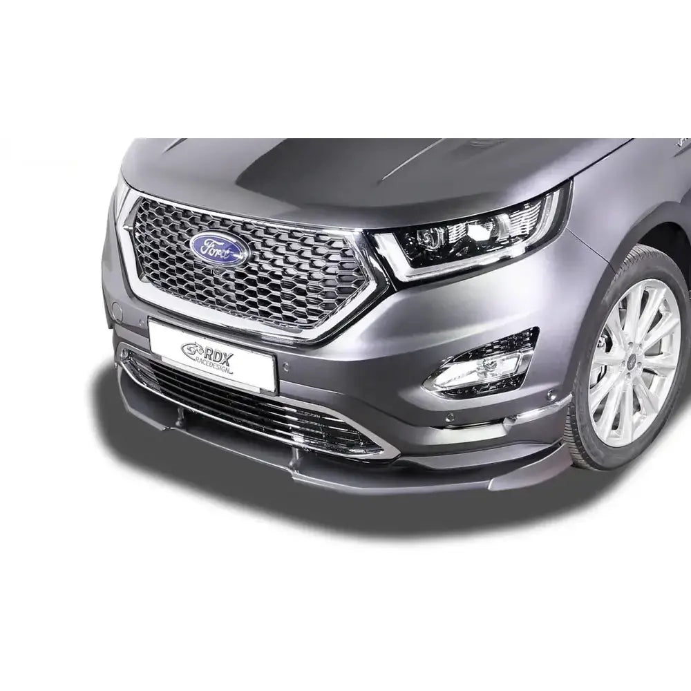 Frontspoiler Ford Edge 2 15- Vignale Vario X i svart montert på sølvgrå bil med kromgrill og moderne frontlykter.