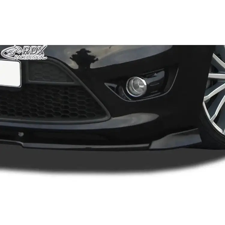 Spoiler til Ford Focus 2 ST 08-10 Facelift, sort blank plast montert ved støtfanger og tåkelys.