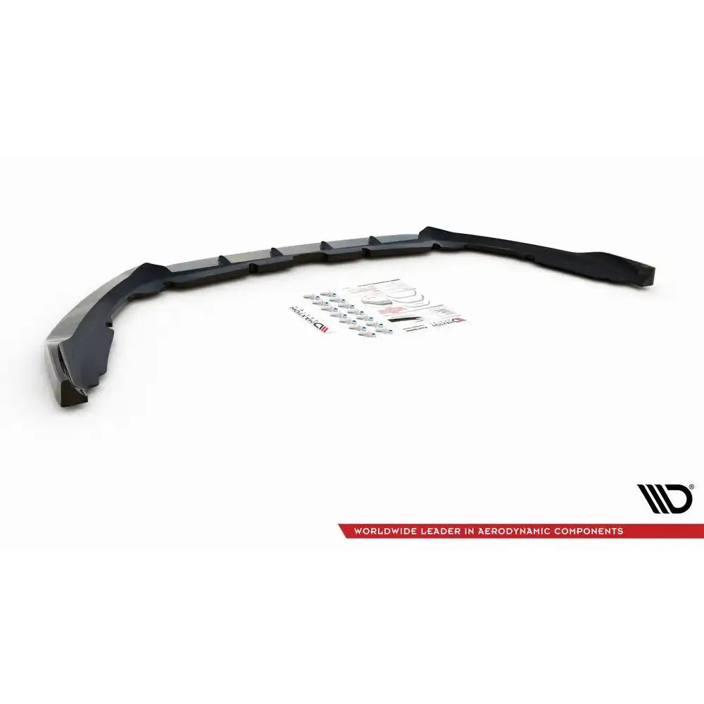 Spoiler til Ford Mondeo MK5 Facelift, sort plast med monteringsutstyr og instruksjoner sett ovenfra.