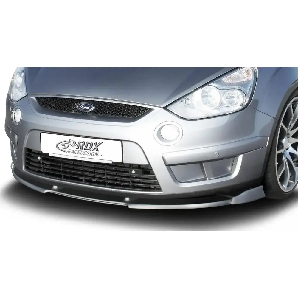 Frontspoiler til Ford S-Max 06-10 med svart splitter på sølvfarget bil, sett forfra med store frontlykter.