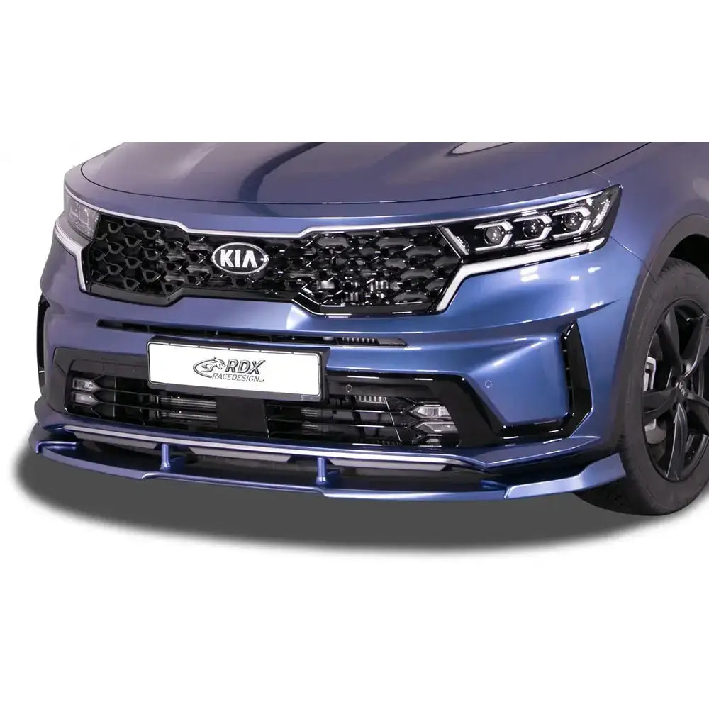 Frontspoiler Kia Sorento MQ4 med sort sportsgrill og ekstra leppe spoiler foran på blå bil.