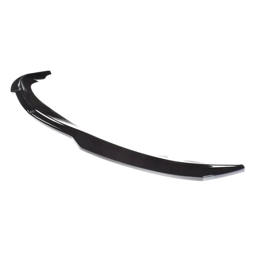 Spoiler til Maserati Quattroporte Mk5 Facelift, sort og glanset, sett skrått ovenfra mot hvit bakgrunn.